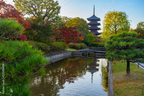 Japan. Kyoto. Kiyomizu Dera. View from the pond on the tower of the temple of pure water in Kyoto. Iconic buildings of Japan. Park near Kiyomizu Dera temple.Travel to the East Asia.