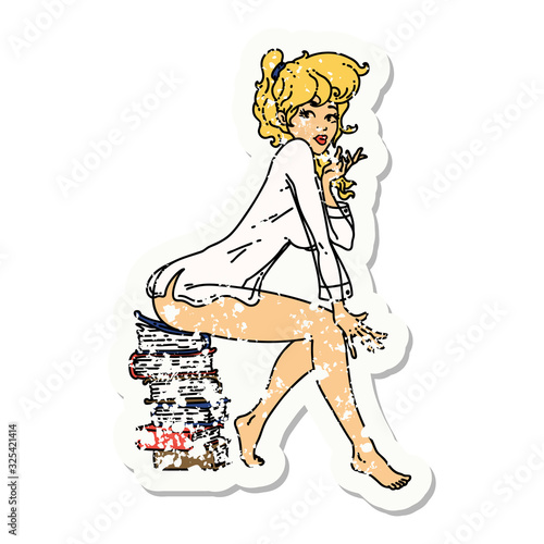 distressed sticker tattoo of a pinup girl sitting on books