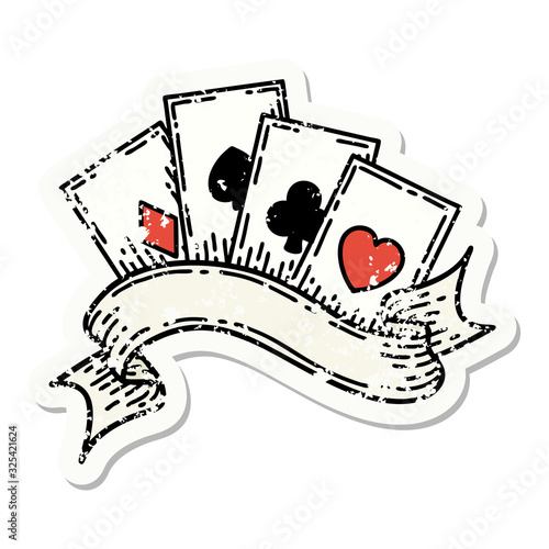 traditional distressed sticker tattoo of cards and banner