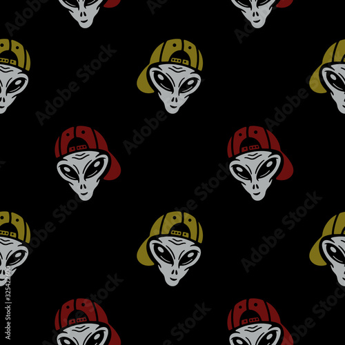 Color alien in the cap on black background 