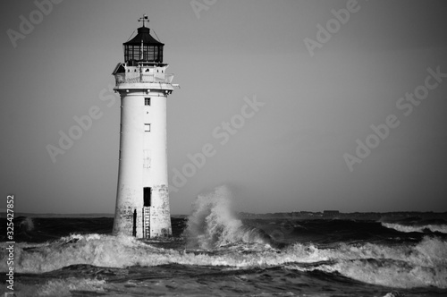 Black and white lighthouse in a storm