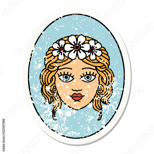 traditional distressed sticker tattoo of a maiden with crown of flowers