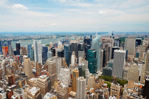 Manhattan midtown panorama view with big skyscrapers, New York City, USA. Manhattan beautiful skyline, NYC panorama. Top of the buildings in financial district. Business background.