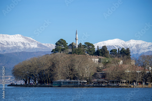 ioannina city lake pamvotis in winter season greece photo