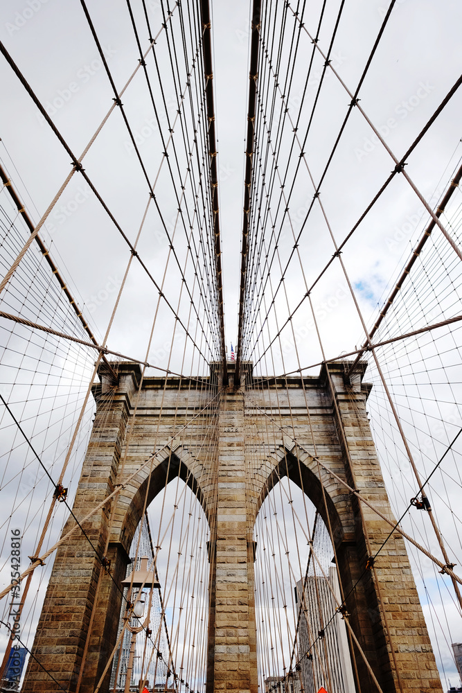 Fototapeta premium Brooklyn Bridge, New York, USA. Beautiful view of Manhattan, NYC. Manhattan midtown view panorama in financial district. Business background.