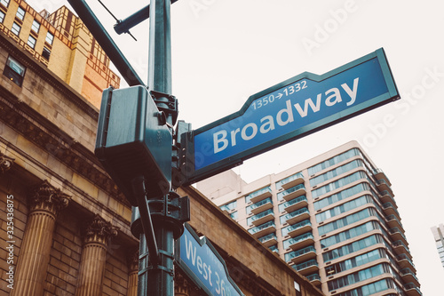 Corner of the Broadway and West 36th Street sign, New York City, USA. New York City, United States famous Broadway sign in Manhattan. Famous broadway street signs in downtown New York.