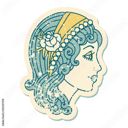 distressed sticker tattoo style icon of a gypsy head