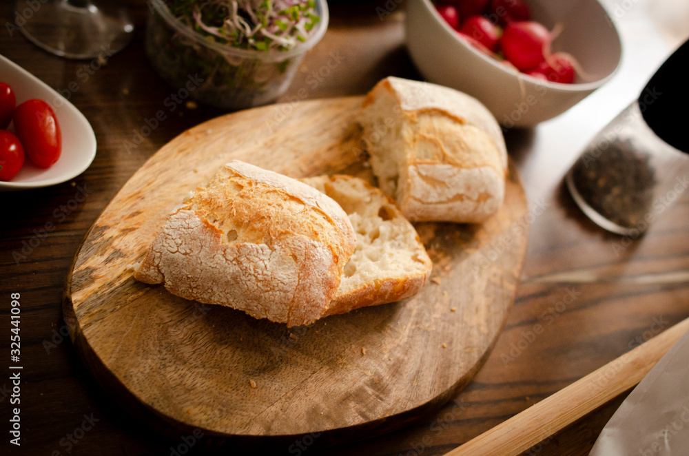 pieces of ciabatta on a wooden board