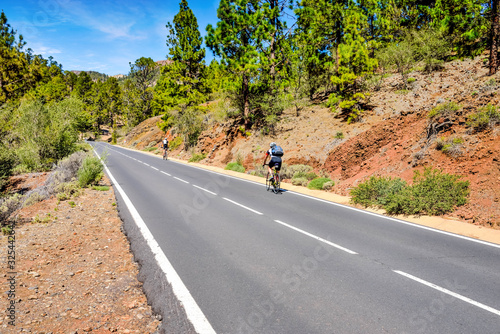 cyclist on the roads crossing the beautiful desert landscape on the island of Tenerife