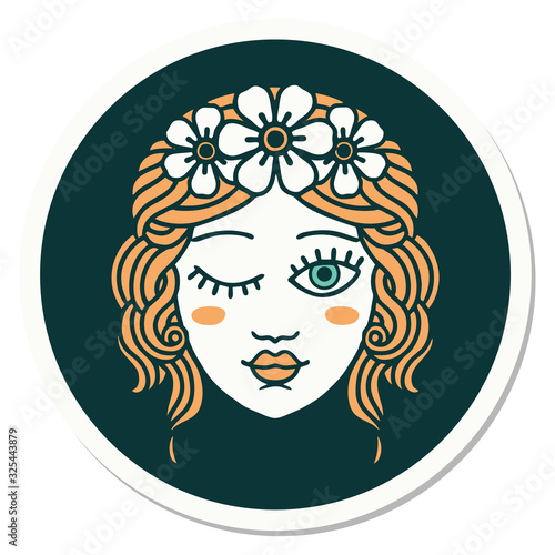 tattoo style sticker of a maidens face winking