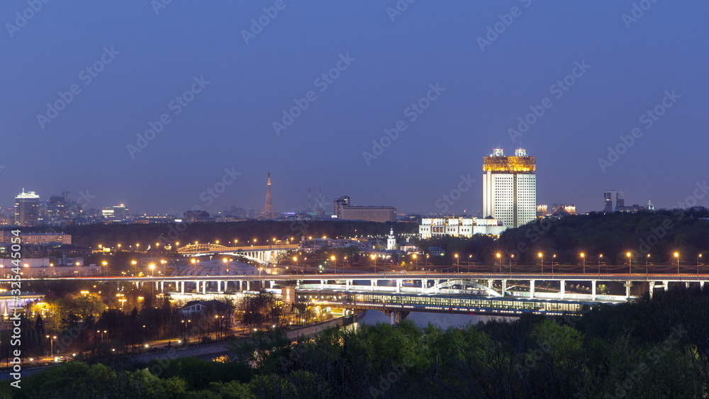 Evening view of the Academy of Sciences and the Shukhov Tower from the observation deck on the Sparrow Hills in Moscow timelapse