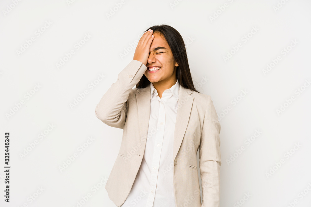 Young woman isolated on a white background forgetting something, slapping forehead with palm and closing eyes. Young woman isolated on a white background forgetting something, slapping forehead with palm and closing eyes.