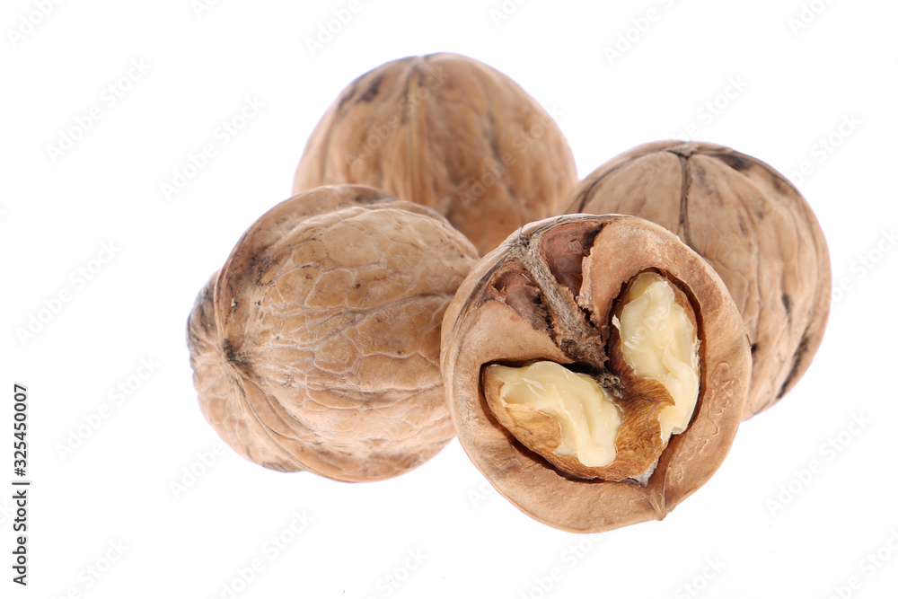 Whole and cracked walnuts isolated on white background Whole and cracked walnuts isolated on white background