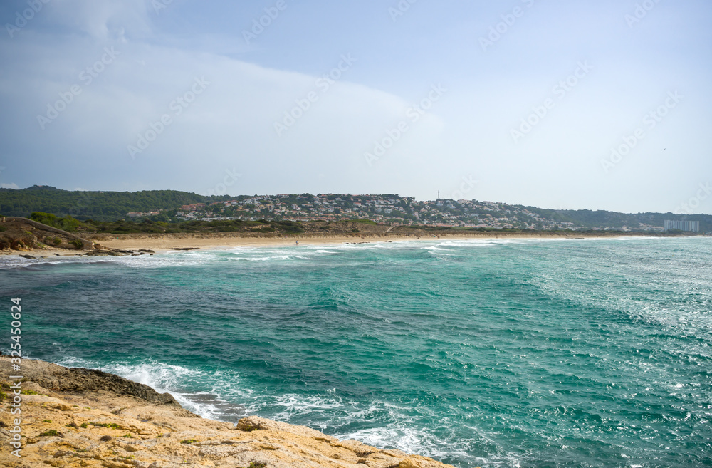 Alaior Cala Son Bou in Menorca turquoise beach at Balearic islands, Spain