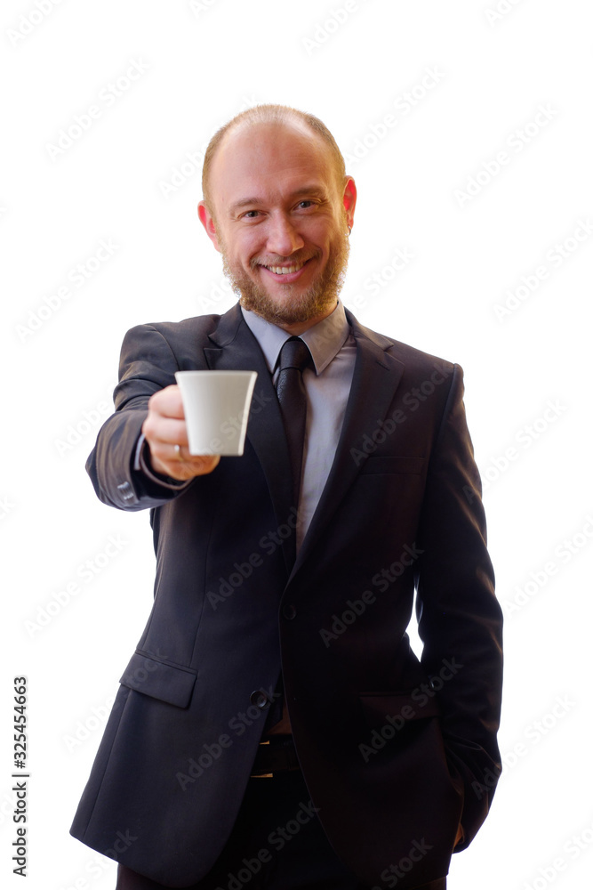 Businessman in a black suit holding a cup of aromatic coffee or refreshing tea. Man drinking black coffee. Breakfast or lunch break. Inhale the aroma of coffee or a refreshing drink tea. Businessman in a black suit holding a cup of aromatic coffee or refreshing tea. Man drinking black coffee. Breakfast or lunch break. Inhale the aroma of coffee or a refreshing drink tea.