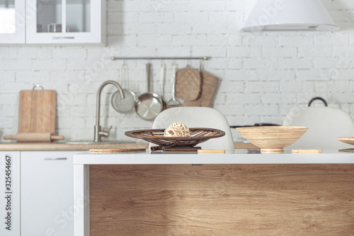 Modern stylish Scandinavian kitchen interior with kitchen accessories. © puhimec