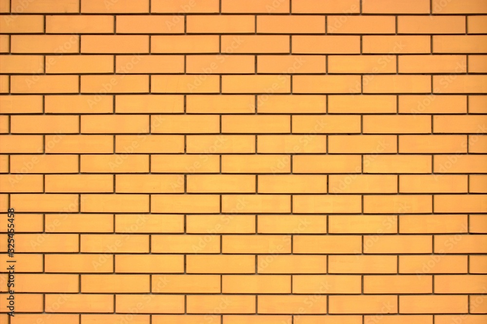 Light brown brickwork. The surface is flat and smooth. Light brown brickwork. The surface is flat and smooth.