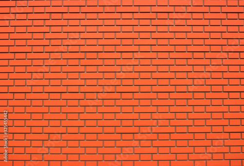 Smooth surface of red brickwork
