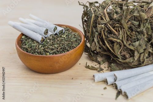 marijuana and in the rolled joint on a table.