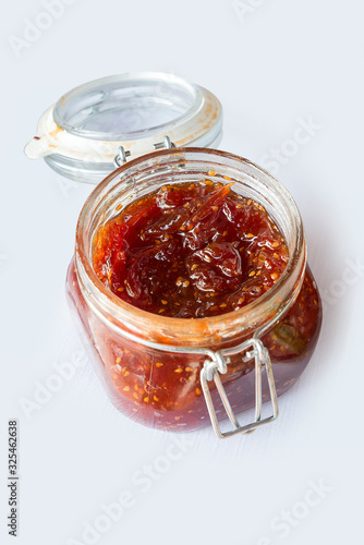 Square glass jar with fig jam