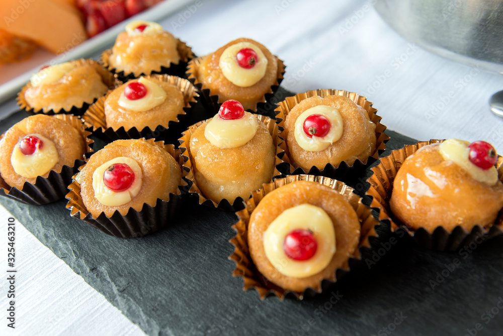 Dessert buffet with baba rum