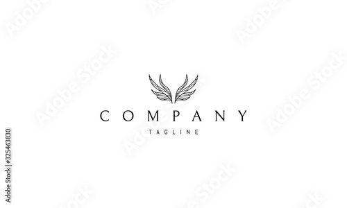Vector logo on which an abstract image of wings in the form of leaves.