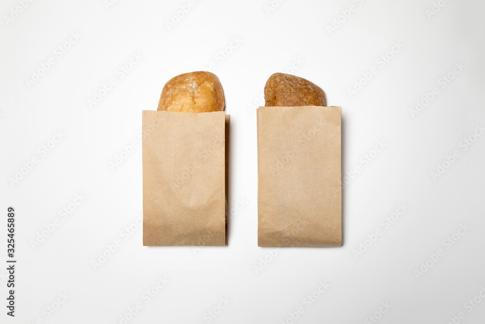 Fresh Black and White Bread in a brown kraft Paper Bag Mockup on white ...