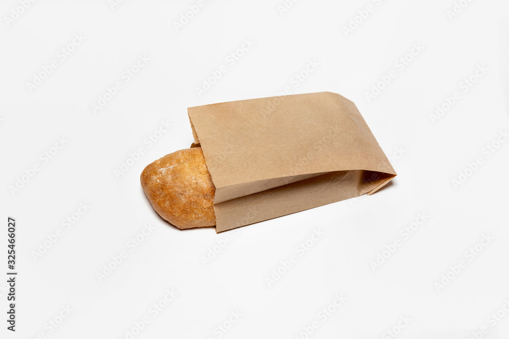 Fresh Bread in a brown kraft Paper Bag Mockup on white background.High  resolution photo. Stock Photo | Adobe Stock