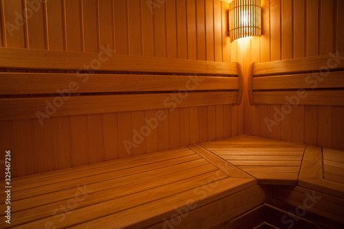 Traditional wooden dry steam room in country house.