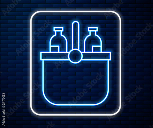 Glowing neon line Cooler bag and water icon isolated on brick wall background. Portable freezer bag. Handheld refrigerator.  Vector Illustration