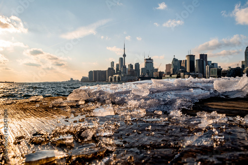 Blurry Toronto Skyline Behind Ice on Polson Pier photo