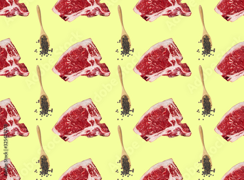 Beef steaks and t-bone meat cuts seamless on colorful yellow background. Pattern background. photo