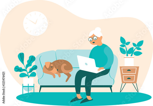 Senior Woman at home with Laptop in Hands