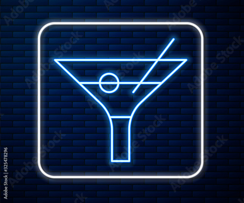 Glowing neon line Martini glass icon isolated on brick wall background. Cocktail icon. Wine glass icon. Vector Illustration