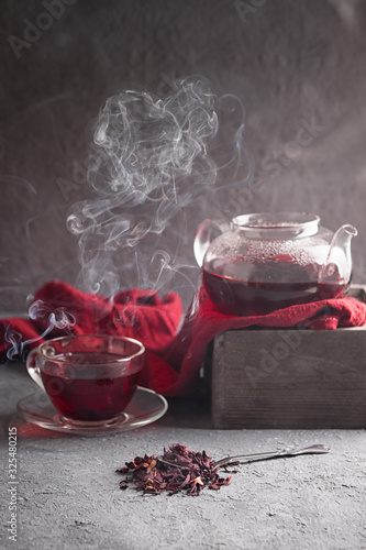 Composition with hibiscus tea on wooden table. Weight loss concept