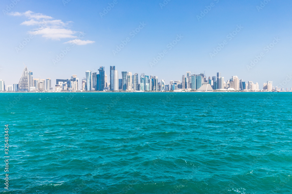 The skyline of West Bay with numerous modern fast growing skyscrapers of Al Dafna, Doha, Qatar.