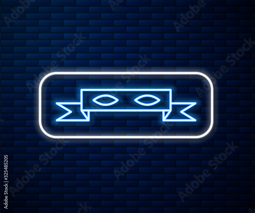 Glowing neon line Thief eye mask icon isolated on brick wall background. Vector Illustration