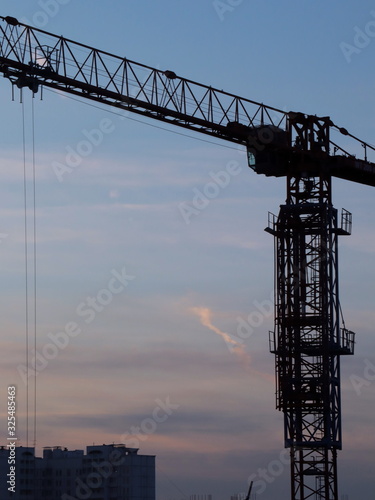 crane on background of blue sky