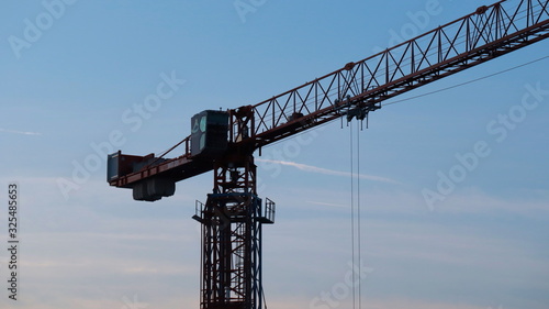 crane on background of blue sky