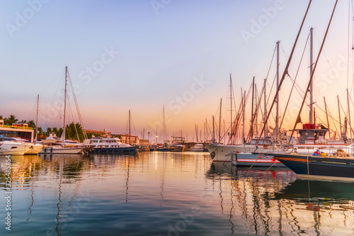 Yachts docked in the Marina at sunset, Palma, Spain © Tasawer