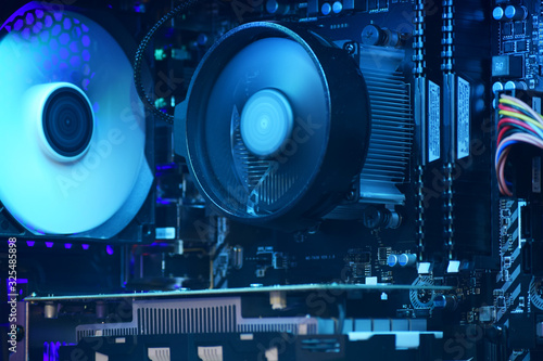 Gaming computer pc motherboard with its components and led lights