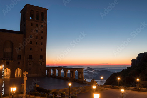 Bell tower of the monastery of Montserrat, Spain at sunrise photo