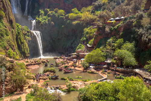 Tourists at Ourika water falls near Marrakesh in Morocco in summer