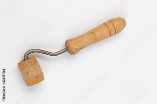 wooden roller on white background