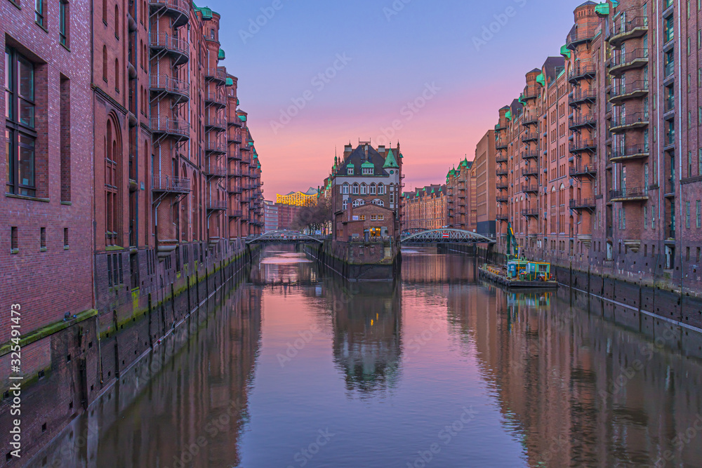 Water castle in Speicherstadt at sunrise in Hamburg, Germany