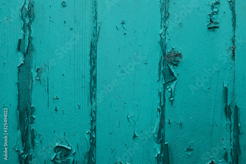 Chipped wooden painted background turquoise 