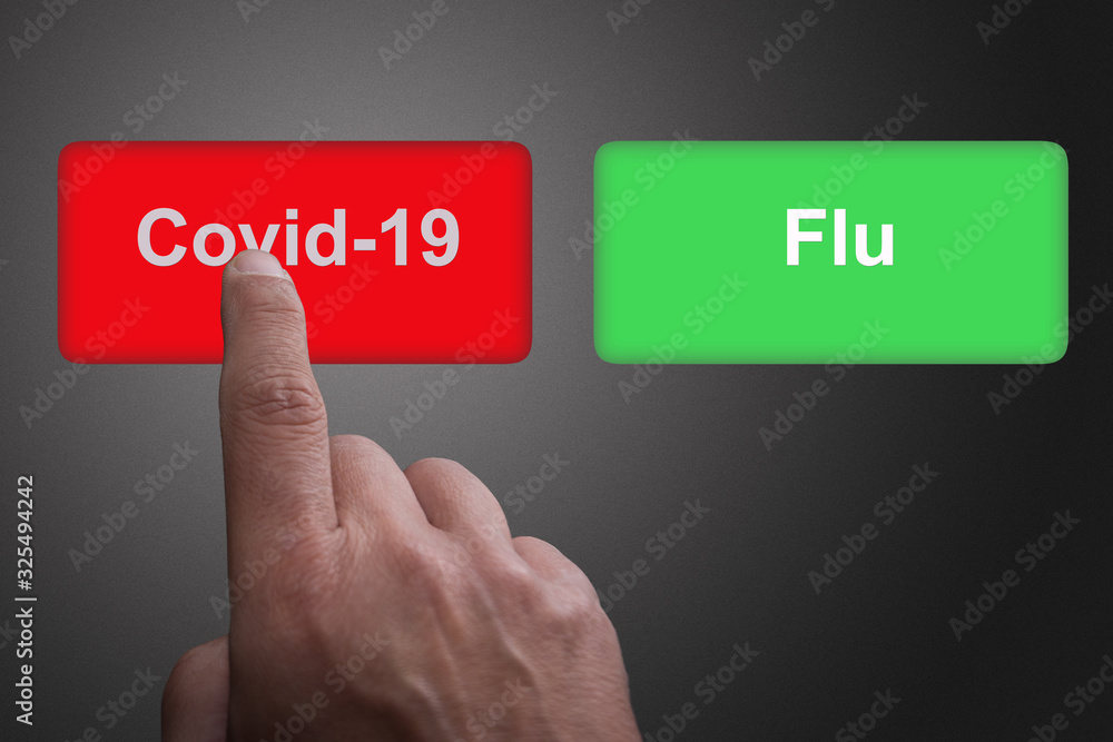 Red and green buttons with Covid-19 and Flu and pointing finger, on a gray gradient background, on Covid 19 Red and green buttons with Covid-19 and Flu and pointing finger, on a gray gradient background, on Covid 19