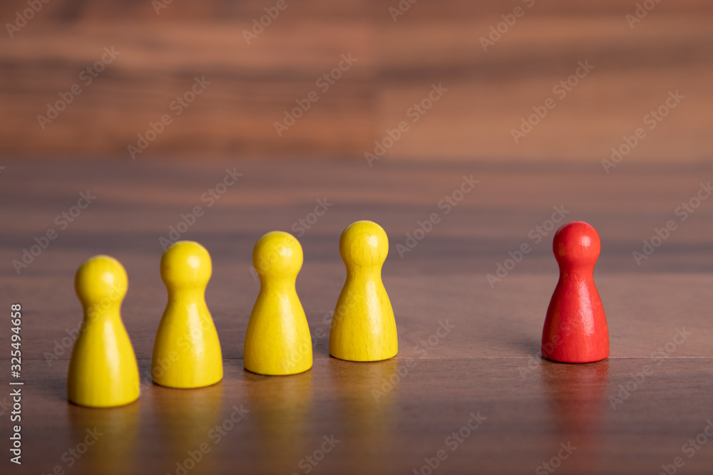 wooden figurines for a team and a separate person or opinion wooden figurines for a team and a separate person or opinion