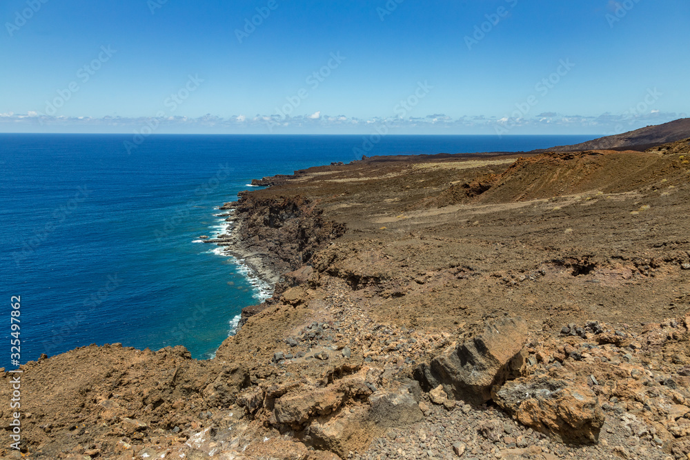 Volcanic landscape near Orchilla lighthouse. Southwest coast of the El Hierro island. Spain