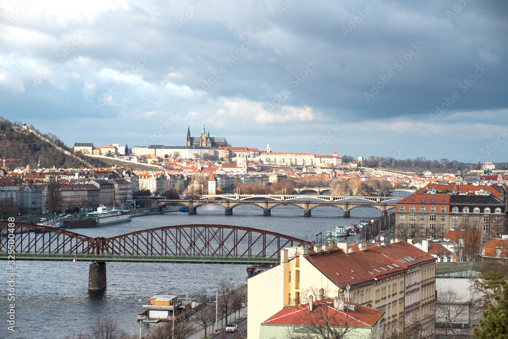 View from Visegrad to winter Prague, bridges and St. Vitus Cathedral